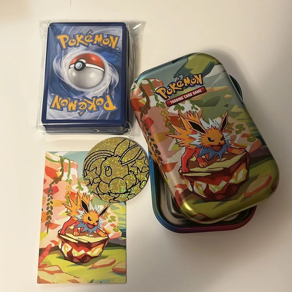 Pokemon Prismatic Evolution Tin Jolteon Design with 50 card bundle